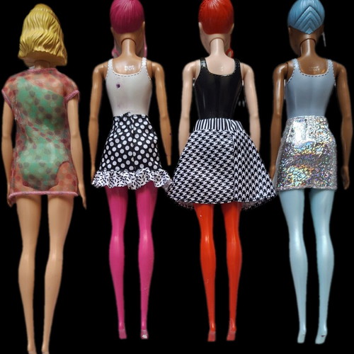 Lot of four dolls like new