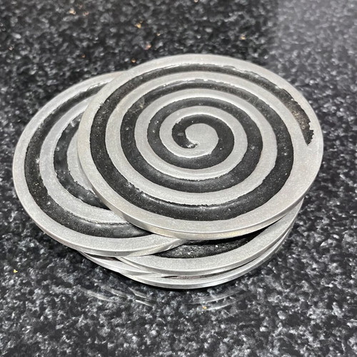 Metal Spiral Coasters like new