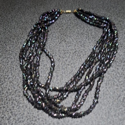Torsade necklace used with iridescent carnival glass beads, 50cm