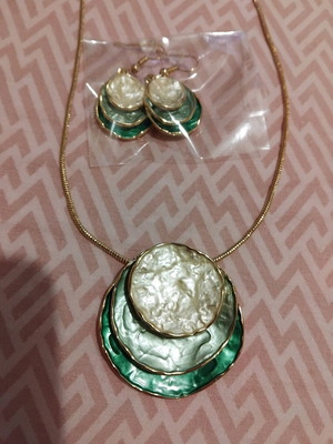 Jewelry earrings and gold-tone pendant necklace with green and white shades