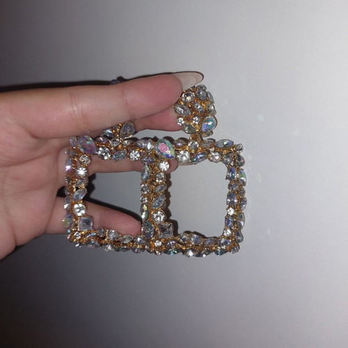Long shiny earrings used