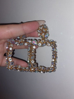 Long shiny earrings used