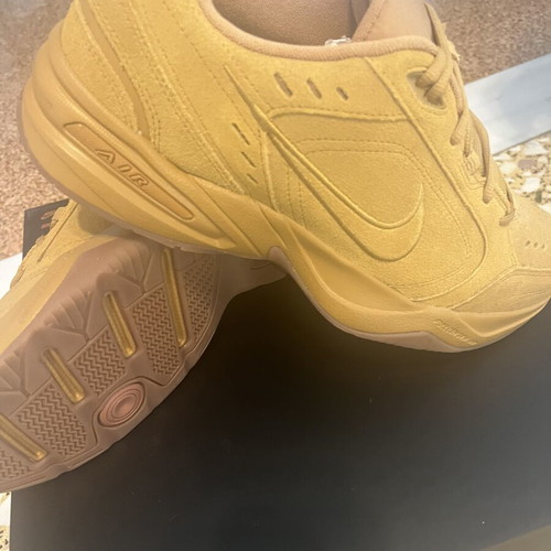 Nike Monarch athletic shoes size 47.5, gold