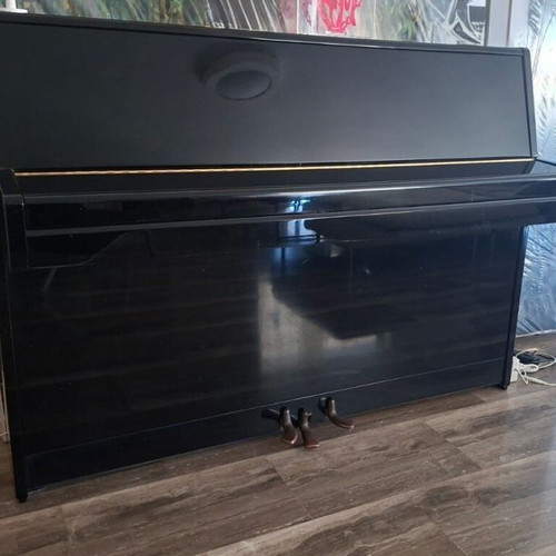 Yamaha M1J piano used in very good condition