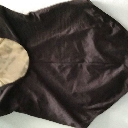 One-piece swimsuit printed black with beige and brick in excellent condition