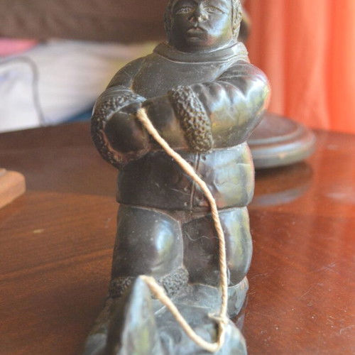 Three Inuit figurines used, indigenous Eskimo creations from Canada