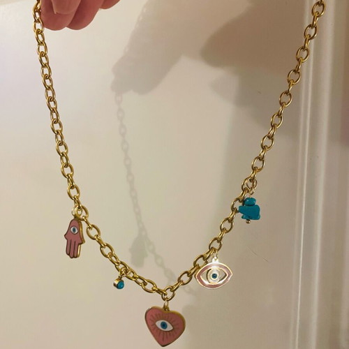Steel necklace new with charms