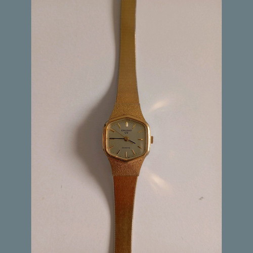 Orient vintage women's watch used, gold color, needs repair