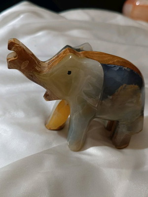 Elephant figurines and fish made of natural onyx stone like new