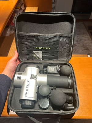 Phoenix massage gun like new for deep relaxation