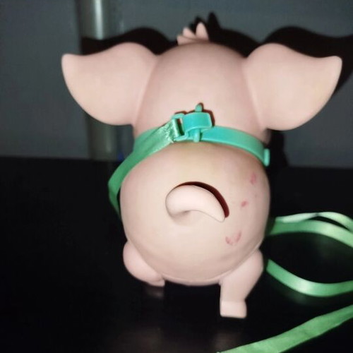 Electronic robotic pig used with sound and movement