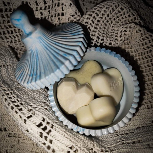 Set of handmade olive oil soaps with porcelain bases