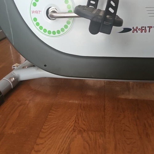 X-Fit stationary bike used with time and calorie counter