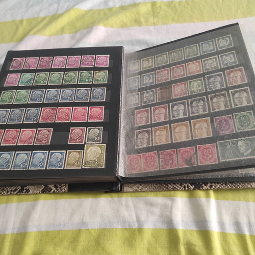 Stamps like new, 702 pieces with album