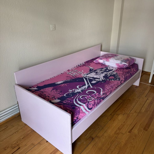 Children's wooden single bed-sofa in pink shade, used