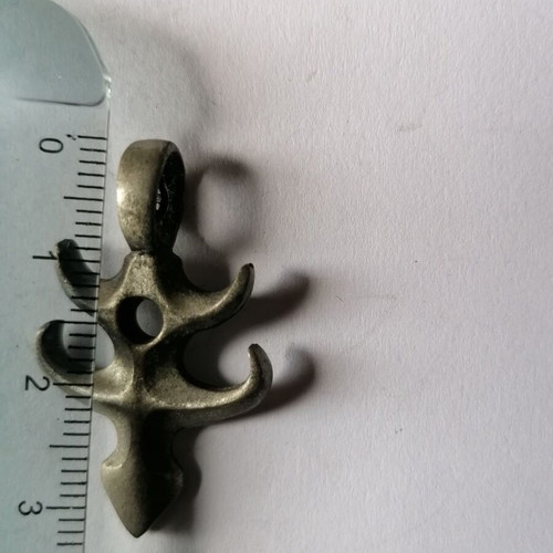 Metal Fishbone Pendant new with tribal designs