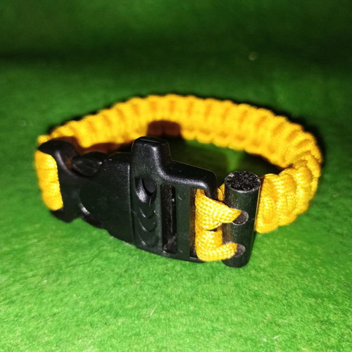 Paracord bracelet survival with cord, whistle and fire starter
