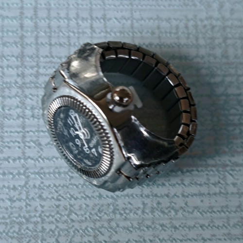 Ring watch quartz like new with black dial and silver bracelet