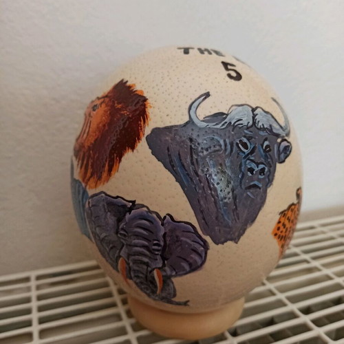 Ostrich egg painted like new with stand and painted animals