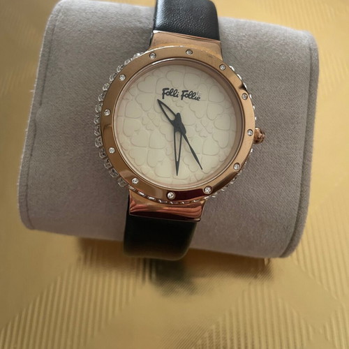 Folli Follie watch like new with rose gold dial and black strap