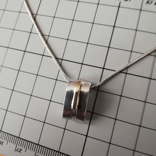 Pendant made of 925 silver and 585 gold used