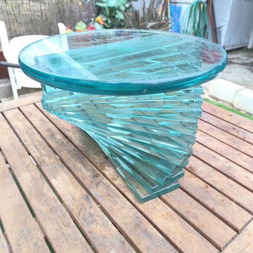 Round coffee table used with glass spiral base