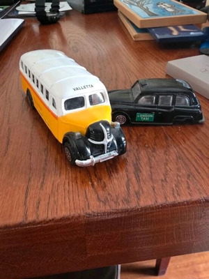 Collectible toy cars used, London Taxi and Valletta bus