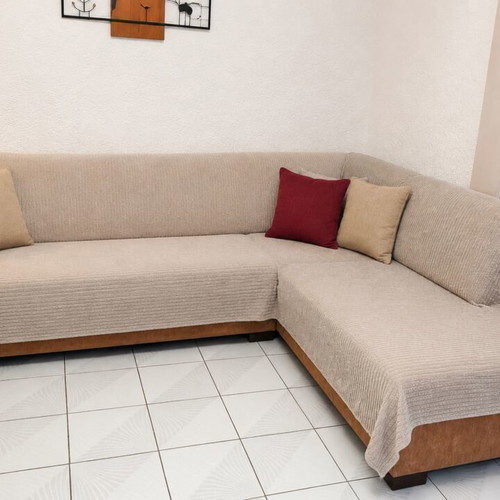 Corner sofa with two-seater and recliner