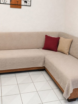 Corner sofa with two-seater and recliner