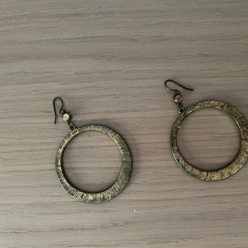 Earrings used with pink rhinestones and dark-colored clasp