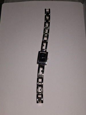 Guess women's thin silver watch used
