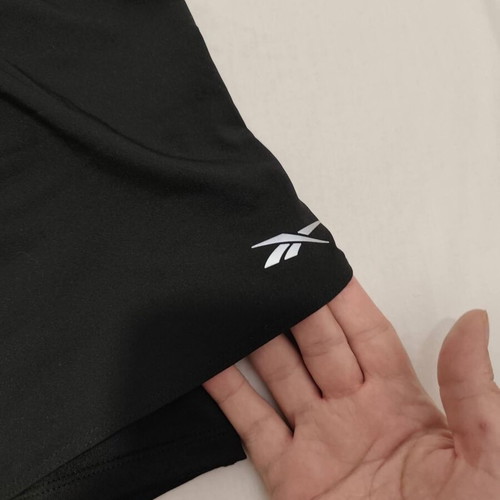 Reebok running shorts with integrated leggings like new, size L, black