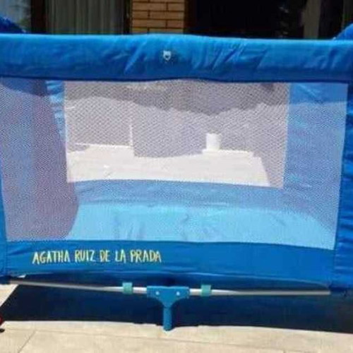 Agatha Ruiz De La Prada baby crib used, blue with yellow star pockets