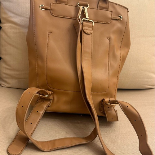 Axel beige backpack like new with missing decorative cord