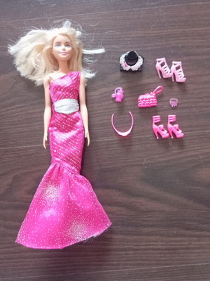 Barbie doll like new with accessories pink dress and shoes