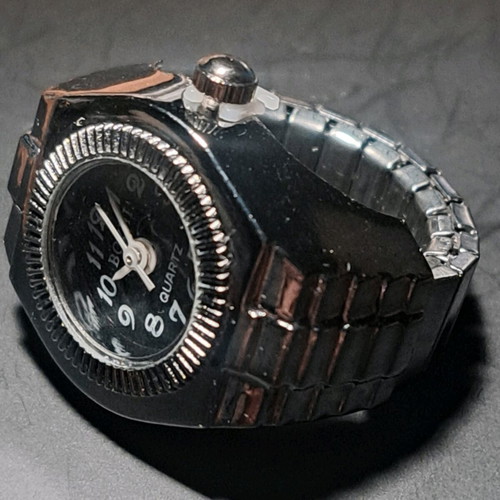 Ring watch quartz like new with black dial and silver bracelet