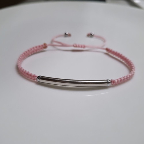 Macrame bracelet with silver steel element, pink cord