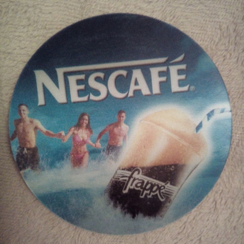 Collectible Nescafe promotional coaster new