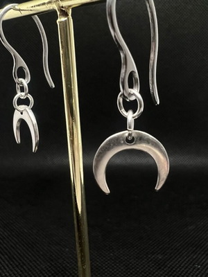 Steel earrings new, silver color