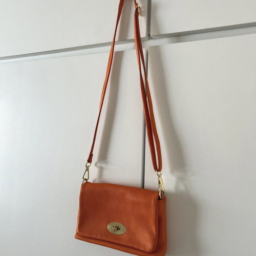 Leather cross body bag like new, orange