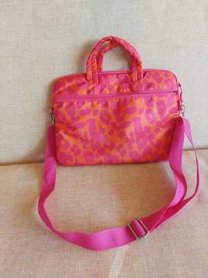 Laptop bag like new with multiple compartments and leopard print
