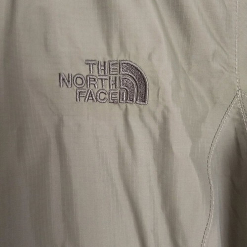 The North Face women's windbreaker jacket like new, khaki, size L
