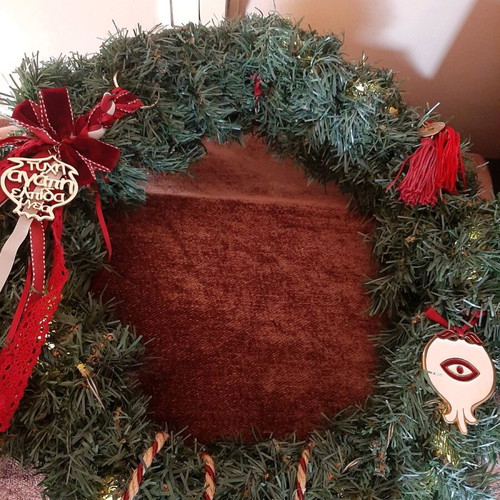 Handmade Christmas wreath with charms and battery lights
