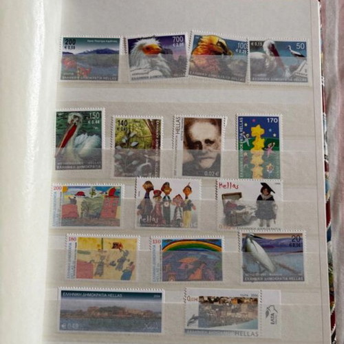 Stamp album like new, including Athens 2004 Olympic Games series