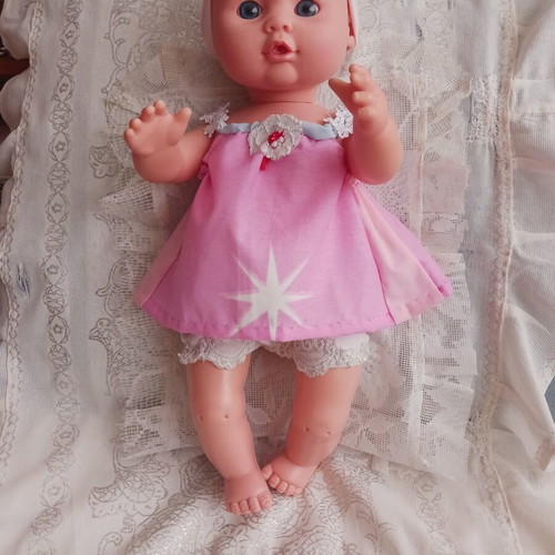 Baby Suzi doll like new with handmade clothes