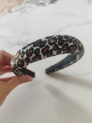 Hairband with leopard print used by abo, black and brown