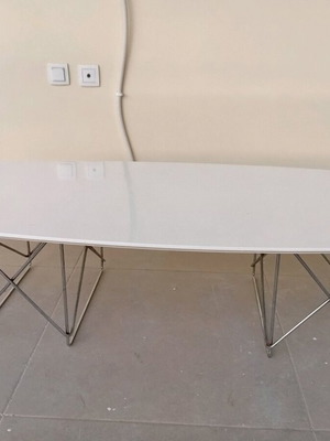 Indoor table used made of MDF and metal