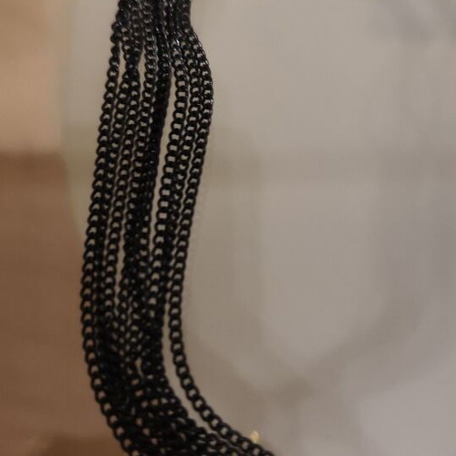 Long gold necklace with black chains new, heavy piece