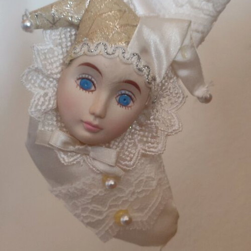 Christmas ornament with harlequin on stocking like new