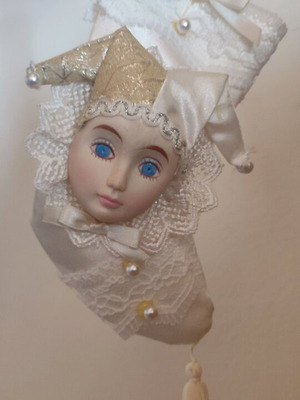 Christmas ornament with harlequin on stocking like new